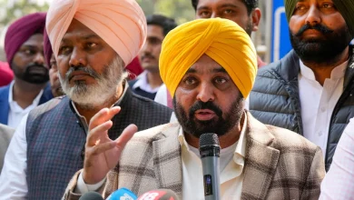 भगवंत मान और हरपाल सिंह चीमा