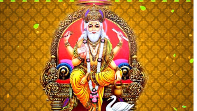 भगवान विश्वकर्मा की प्रतिमा और पूजा करते श्रद्धालु